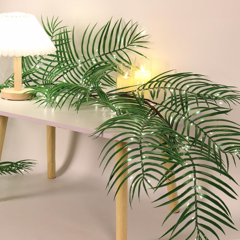 RECUTMS Artificial Palm Leaves Garland Ivy 6FT with 150LED Fairy Lights Battery Operated Faux Tropical Monstera Leaf Greenery Twig Vine Indoor Outdoor Home Christmas Fireplace Mantle Table Decoration