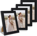 6x9 Picture Frame Set of 4, Made of Real Glass and Black Wooden Frame - 6 by 9 Photo for Wall or Tabletop Display