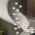 KoKo&Yukina 12-Light Black Mid Century Modern Chandelier for Living Room Staircase Chandelier for Entryway Clear Globe Glass Chandelier High Ceiling Chandeliers Foyer Entryway (Bulb & Remote Incl.)