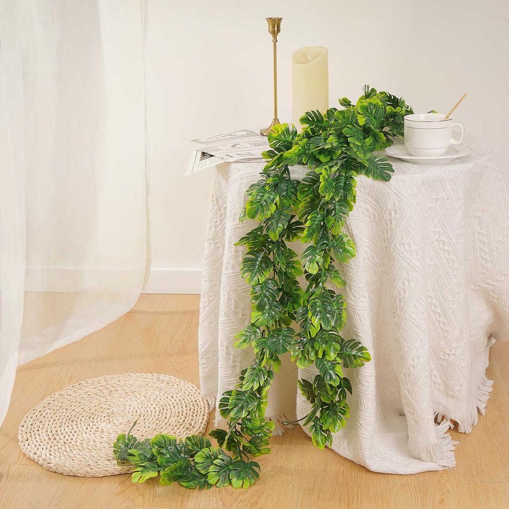 Dolicer 4Pcs Artificial Monstera Leaf Vines, 5.6Ft Fake Hanging Greenery Plants Tropical Palm Leaves Ivy Vine Monstera Garland for Home Garden Porch Patio Hawaiian Party Indoor Outdoor Décor