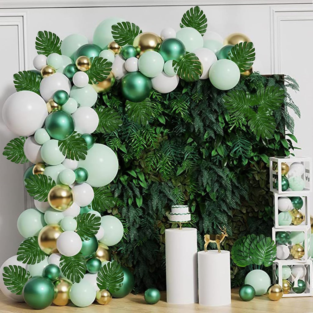 XONOR 100Pcs Artificial Monstera Leaves Fake Tropical Faux Palm Leaves with Stem for Jungle Hawaiian Dinosaur Luau Party Table Decoration Wedding Birthday Theme Party, Leaf Size: 7''x 5''