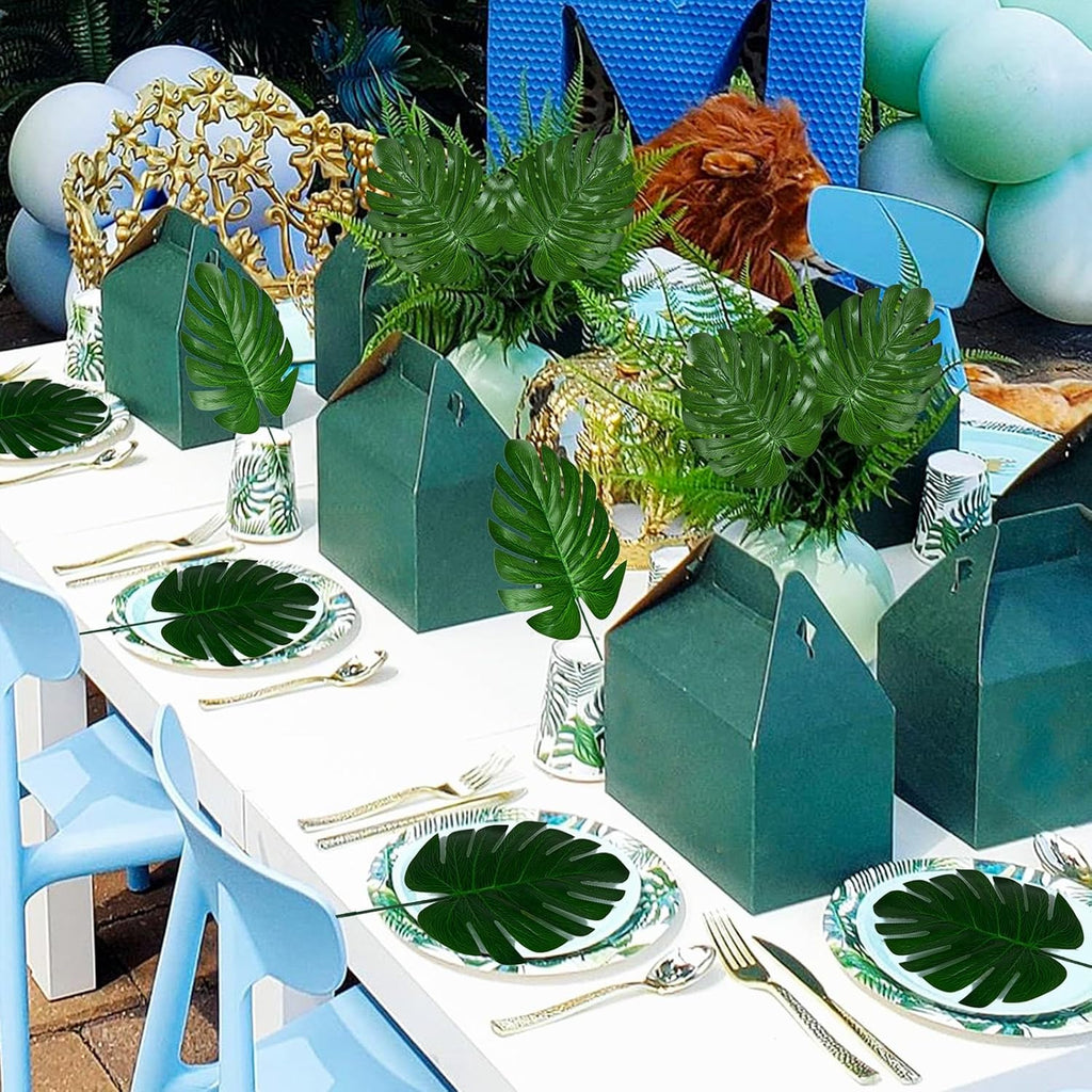 XONOR 100Pcs Artificial Monstera Leaves Fake Tropical Faux Palm Leaves with Stem for Jungle Hawaiian Dinosaur Luau Party Table Decoration Wedding Birthday Theme Party, Leaf Size: 7''x 5''