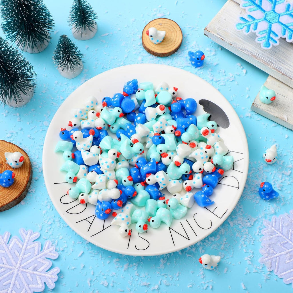 Realspring 100 Winter Mini Resin Snowflake Ducks Tiny Duck Figurines Bulk Cute Figures for Winter Christmas Miniature Landscape Garden Accessories Ornament Dollhouse Birthday Decor Party Favors