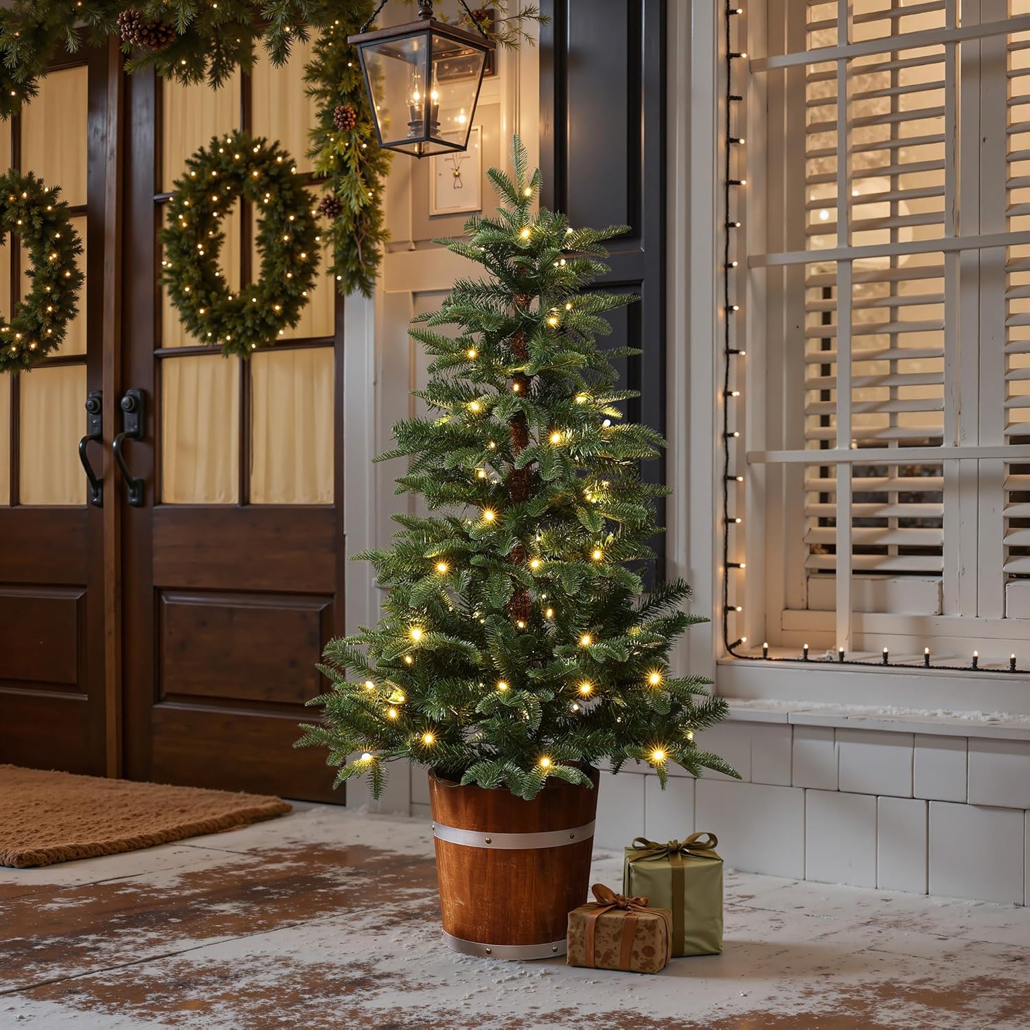LuxenHome 4FT Small Christmas Tree, Prelit Slim Potted Christmas Trees with 100 Warm White LED Lights, Realistic Fir Tree with Rustic Wood Barrel Planter for Entrance, Hallway Holiday Decorations